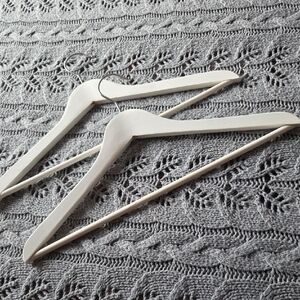 Set of White Wooden Hangers. Free With 25.00 Purchase